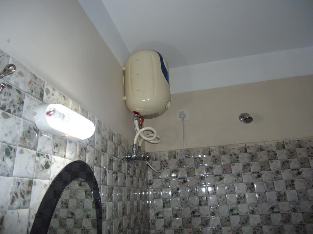 Hotel Debjyoti Сіліґурі Номер фото
